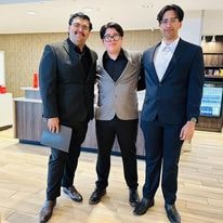 BAT-LSAMP—hotel lobby group photo